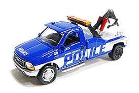 Johnny lightning Ford F450 Tow Truck1999 Police